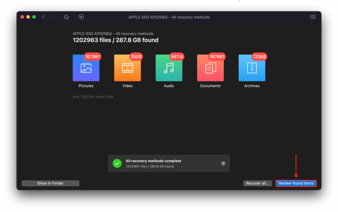 Disk Drill scanning window showing a pointer towards Review Found Items button 