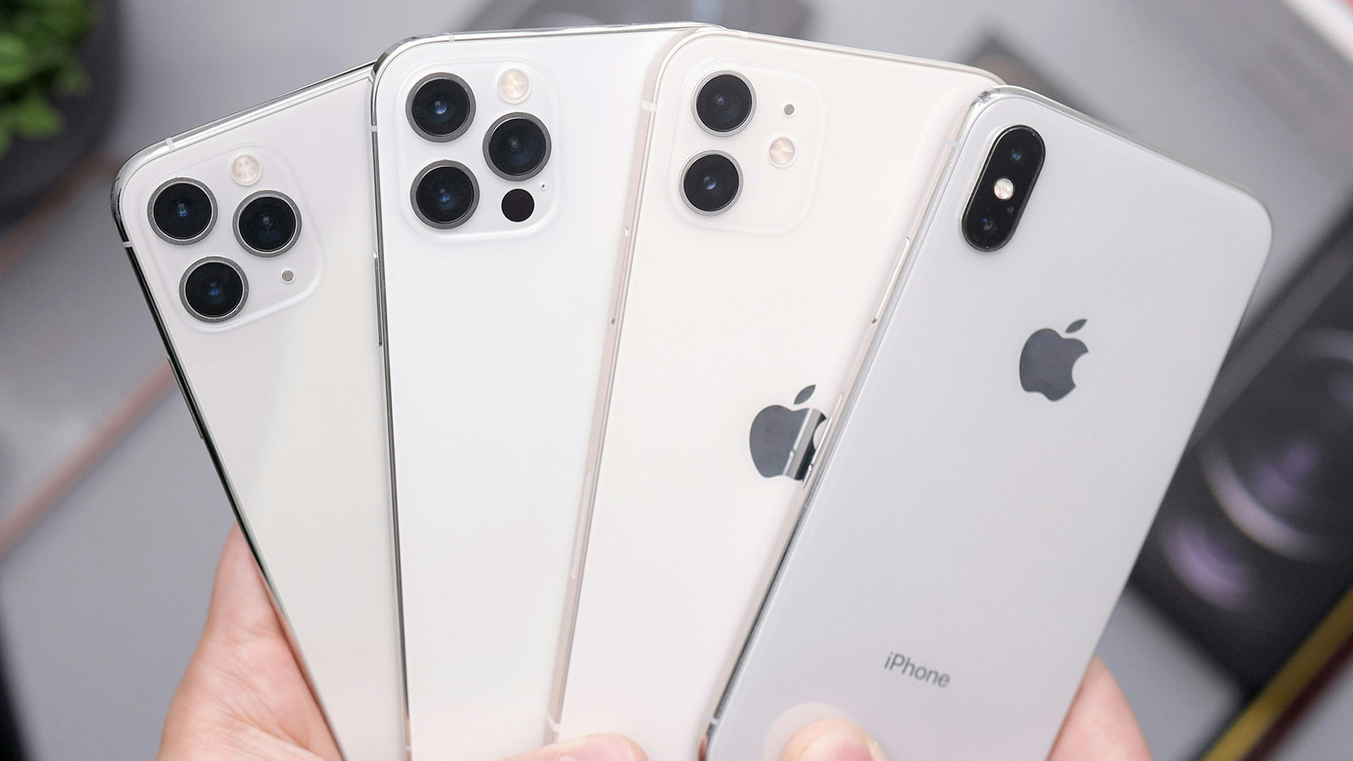 iphones in hands